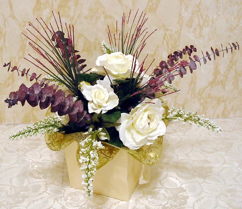 Wedding Table Decoration in purple & white gum leaves
