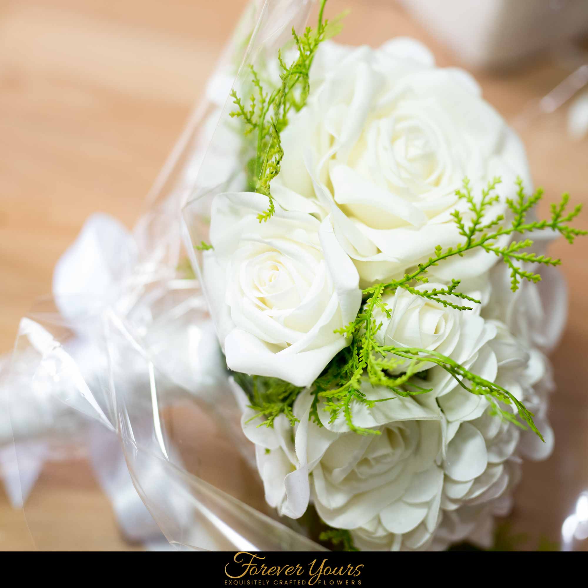 Using Real Touch Roses learn how to create your own wedding bouquet.
