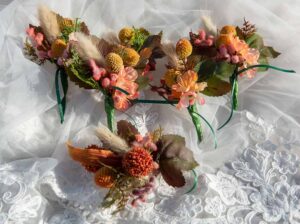 Hannah and Bryce's Mackay wedding with silk, real touch and dried artificial flowers.   Buttonholes