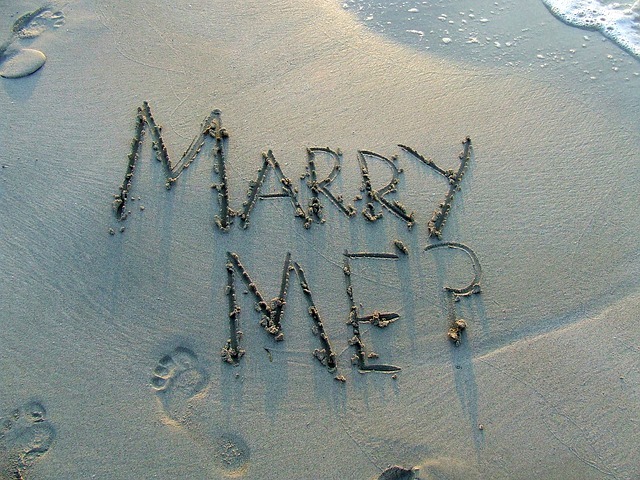 Marry Me written in the sand